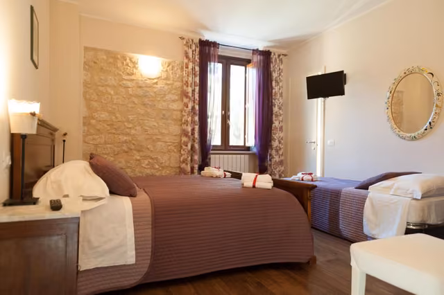 Camera quadrupla con più posti letto della locanda